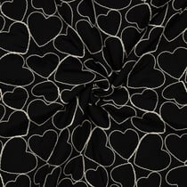 Tissu Matelassé Coeurs brodés Blanc sur fond Noir