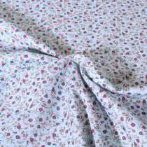 Tissu Popeline de Coton légère Motif floral sur fond Bleu ciel