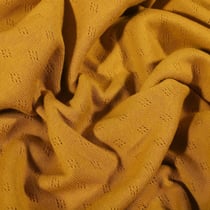 Tissu Jersey Coton ajouré uni Moutarde