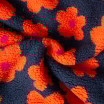 Tissu Sherpa Elya Fleurs oranges sur fond Bleu foncé