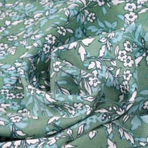 Tissu Viscose Arty Mumba sur fond Vert amande - Au mètre