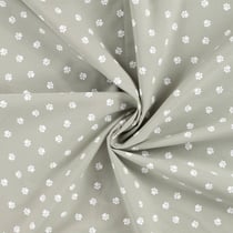 Tissu Popeline de Coton  patounes blanches  Zumi sur fond Vert kaki clair - Au mètre