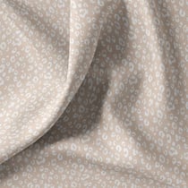 Tissu Coton imprimé léopard Kamar blanc sur fond Beige sable - Au mètre