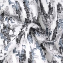 Tissu Maille ethnique duveteux Bleu sur fond Blanc