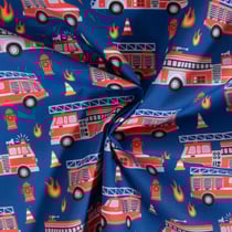 Tissu Coton imprimé Camions de pompiers sur fond Bleu roi