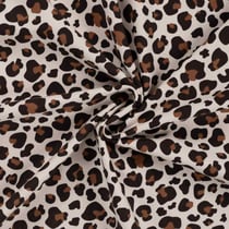 Tissu Jersey stretch Félina sur fond Beige clair - Au mètre