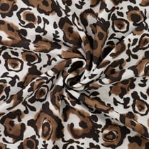 Tissu Viscose texturé Léopard sauvage sur fond Ivoire