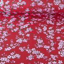 Tissu Coton imprimé Fleur d'amandier sur fond Rouge - Au mètre