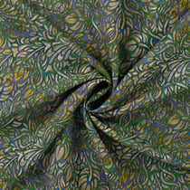 Tissu Voile de Tencel Lin Arabesques fleuries vertes sur fond Bleu