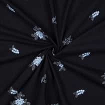 Tissu Voile de Coton Fleurs bleues brodées sur fond Bleu marine
