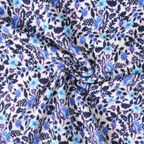 Tissu Sweat léger French Terry Lilia fleurs Bleues sur fond Blanc