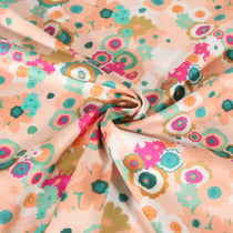 Tissu Voile de Coton digital Fleurs colorées sur fond Pêche - Au mètre