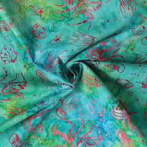 Tissu Coton imprimé Batik Aquaflow sur fond Vert émeraude - Au mètre