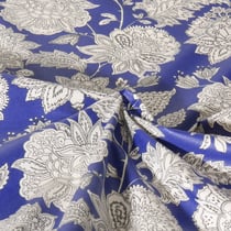 Tissu Coton enduit Sharma fleuris sur fond Bleu roi