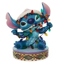 Figurine Enesco Disney Traditions - Lilo et Stitch - Stitch enveloppé dans une guirlande lumineuse de Noël