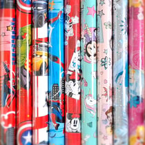 1 rouleau de papier cadeau - 0,70 x 2 m - Collection Disney - Modèles assortis