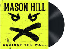 Against the wall
