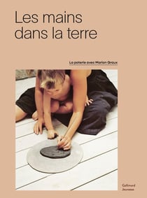 Les mains dans la terre