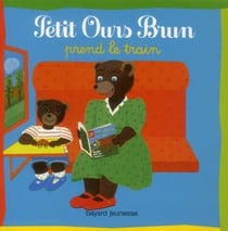 Petit ours brun prend le train