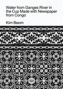 Kim beom water from ganges river in the cup made with newspaper from congo