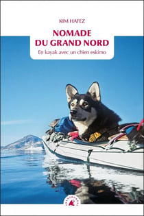 Nomade du grand nord - en kayak avec un chien eskimo