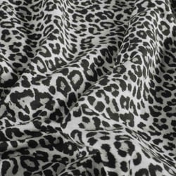 Tissu Sweat léger French Terry Maïa extensible léopard Noir sur fond Blanc