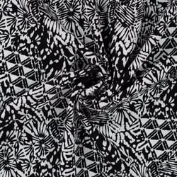 Tissu Viscose imprimé Motifs blancs destructurés sur fond Noir
