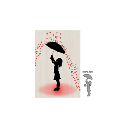 Die petite fille sous une pluie de coeurs