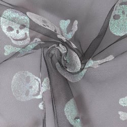 Tissu Tulle souple  Morgana tête de mort paillettes argentés et irisés sur fond Noir - Au mètre