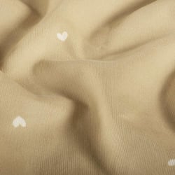 Tissu Velours milleraies Nahia cœurs Blancs sur fond Beige sable