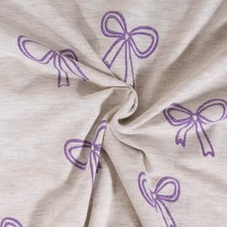 Tissu Jersey Mélangé Poppy Noeuds pailletés violets sur fond Ecru chiné