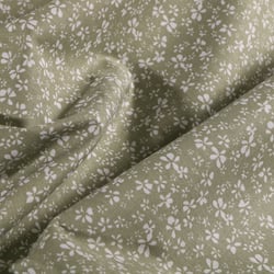 Tissu Coton imprimé Arty Petites fleurs blanches sur fond Vert pâle