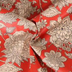 Tissu Coton enduit Sharma fleuris sur fond Rouge