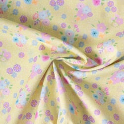 Tissu Popeline de Coton légère Petites fleurs roses et bleues sur fond Jaune pastel