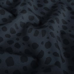Tissu Softshell  Naya léopard Noir sur fond Gris