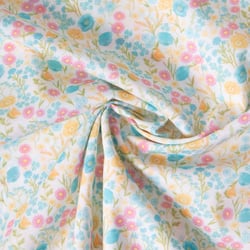 Tissu Popeline de Coton légère fleurs pastel miel, bleu azur et vert prairie sur fond Blanc