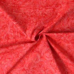 Tissu Coton imprimé Batik Calira sur fond Corail - Au mètre