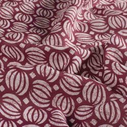 Tissu  Voile de Coton Batik Saria sur fond Prune