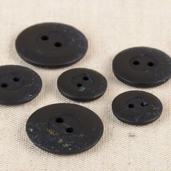 Bouton rond 2 trous copeaux 15mm noir