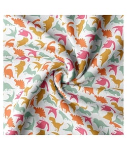 Tissu coton enfant dinosaures multicolores de 150 cm de largeur ARLOBLANC vendu par 50 cm