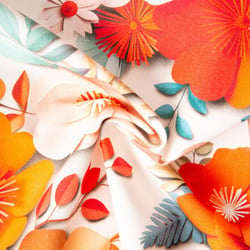 Tissu Toile de Coton Corolles orange et bleu sur fond Blanc