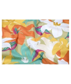 Tissu coton enduit fleurs printanières de 155 cm de largeur vaninaorange vendu par 50 cm