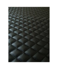 Tissu simili cuir matelassé de 140 cm de largeur 0 Noir vendu par 50 cm