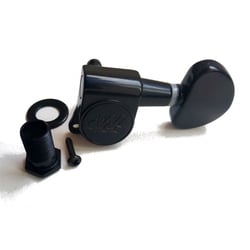 1 Mecanique Bain Huile Wilkinson Noire Côte gauche avec gros bouton oval