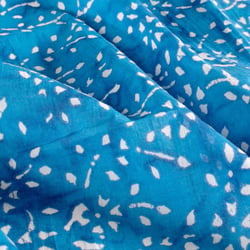 Tissu  Voile de Coton Batik Naya sur fond Bleu turquoise