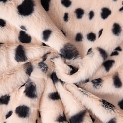 Tissu Fausse fourrure Léna serval noir sur fond Crème