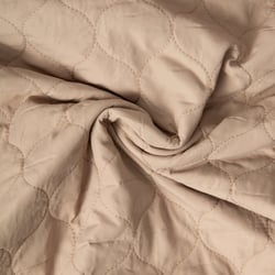 Tissu Doudoune matelassé Garance   sur fond Beige sable