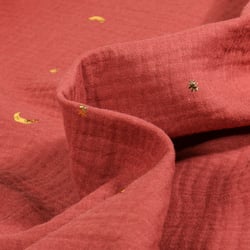 Tissu Double gaze Lunes et étoiles dorées sur fond Terracotta