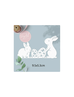 Die lapin de Pâques avec leurs oeufs