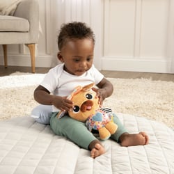 Peluche Lovey le chien à clip pour landau et poussette